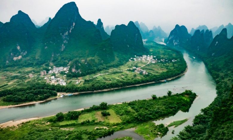 Photo of یانگ شوو شهرستانی با کوه های کارست در نزدیکی گویلین| جاذبه های چین